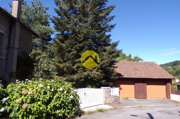 Maison-terrain et garage