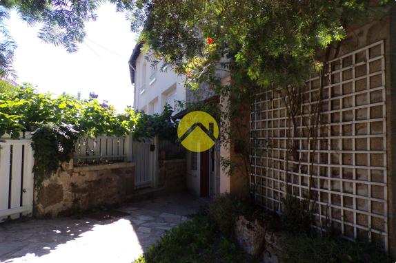 Maison-terrain et garage