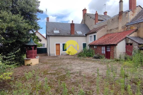 MAISON CTRE VILLE AVEC TERRAIN