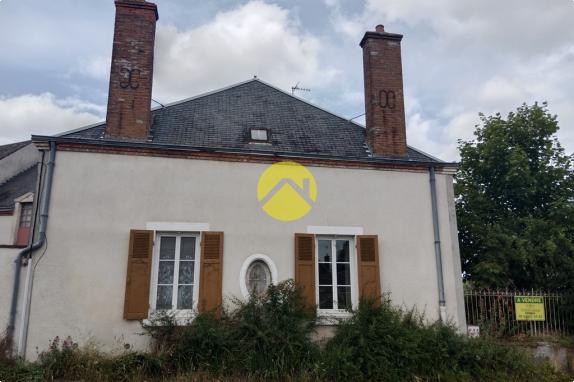 Charme et authenticité : Maison de pierre à rénover