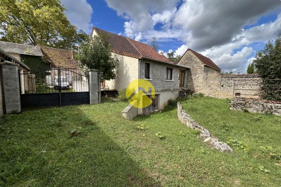 Maison avec jardin et grange 