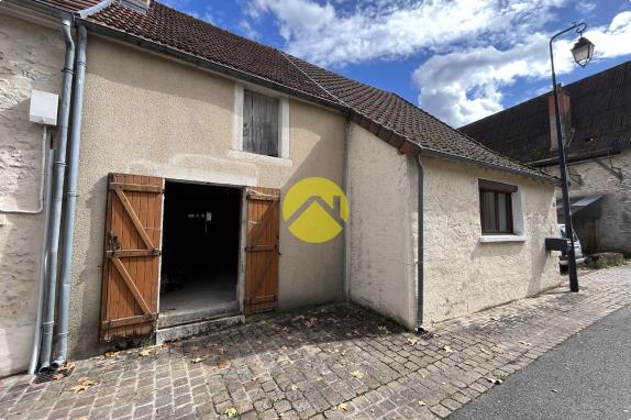 Maison avec jardin et grange 