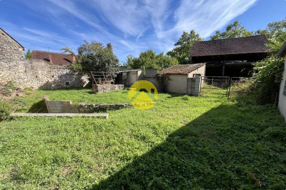 Maison avec jardin et grange 