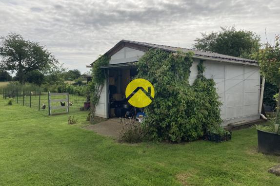 Maison avec terrain au calme