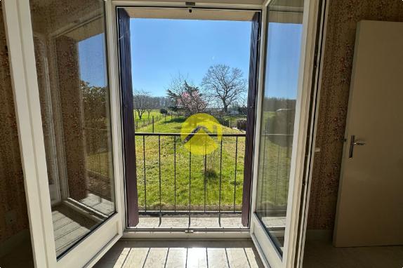 PAVILLON SUR SOUS-SOL  58M² 