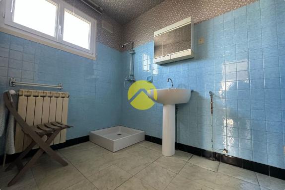 PAVILLON SUR SOUS-SOL  58M² 