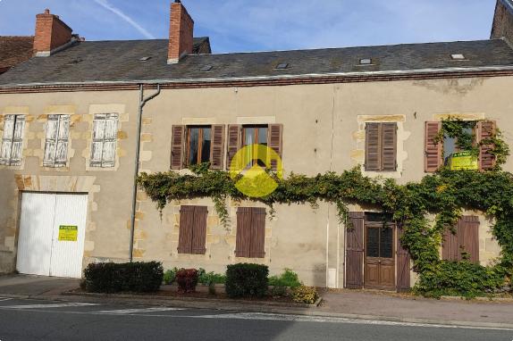 Maison avec garage et jardin