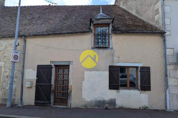 Maison de bourg.Potentiel 150m2