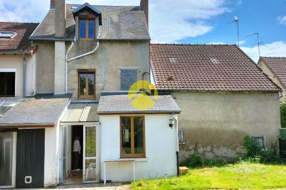 MAISON DE VILLE AVEC JARDIN