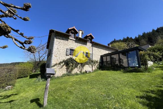 Propriété avec terrain et étang