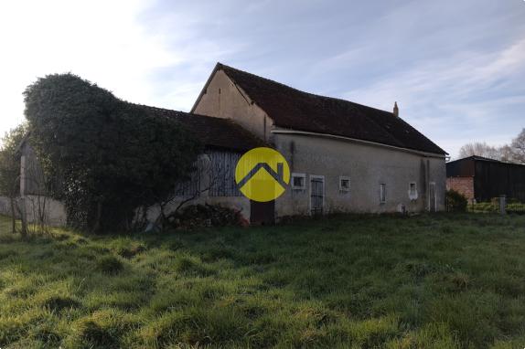 Corps de ferme proche village