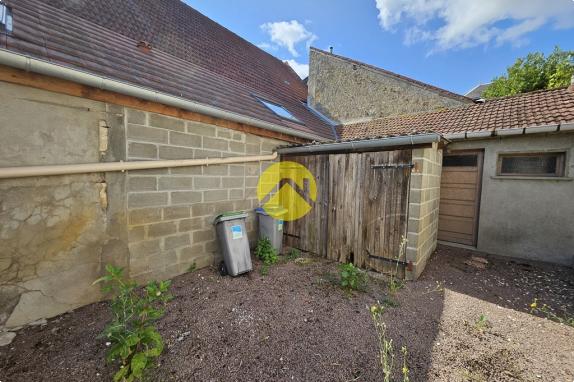 Maison de ville double potentiel