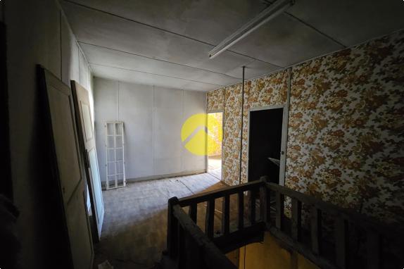 Maison de ville double potentiel