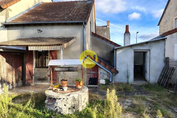 Maison et terrain en centre ville