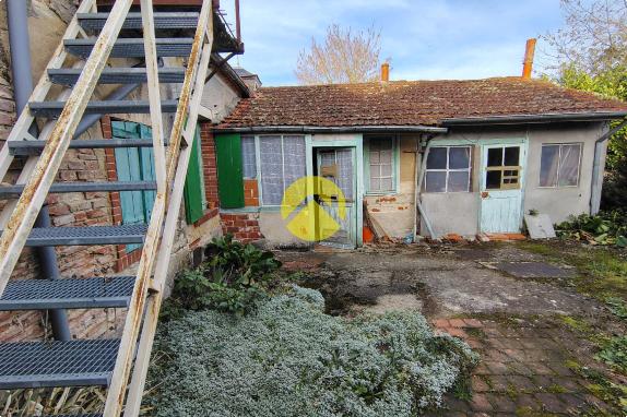 Maison et terrain centre ville