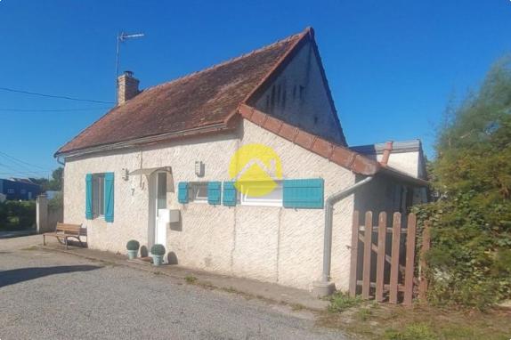 Maison avec un grand garage