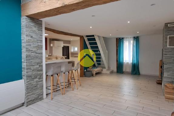 Maison avec un grand garage