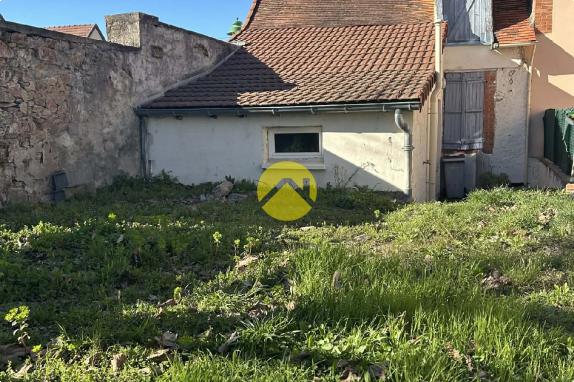 Maison mitoyenne d'un côté