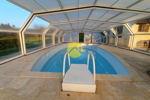 Belle maison avec un grand terrain 