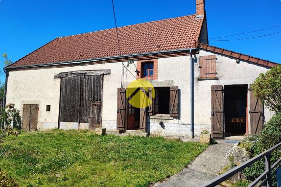 Maison de 55mm² avec un plan d'eau.