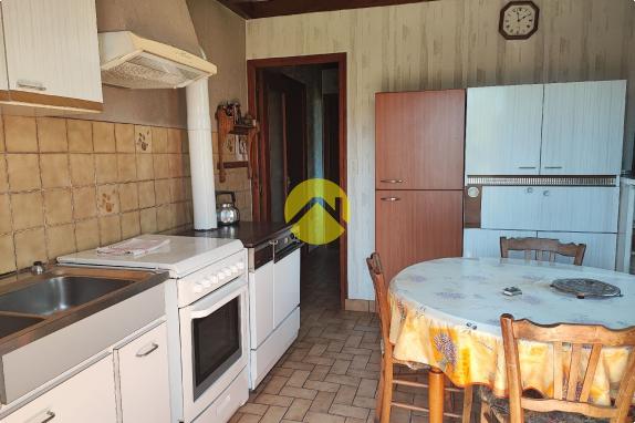 Maison de 55mm² avec un plan d'eau.