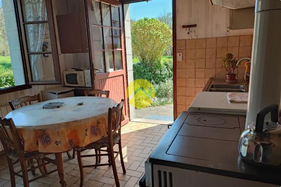 Maison de 55mm² avec un plan d'eau.