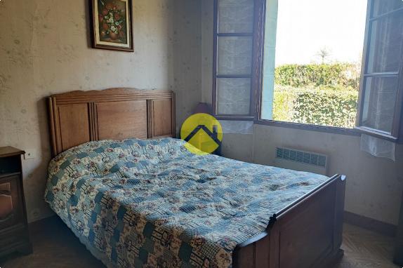 Maison de 55mm² avec un plan d'eau.