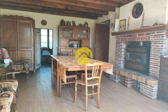 Maison de 55mm² avec un plan d'eau.