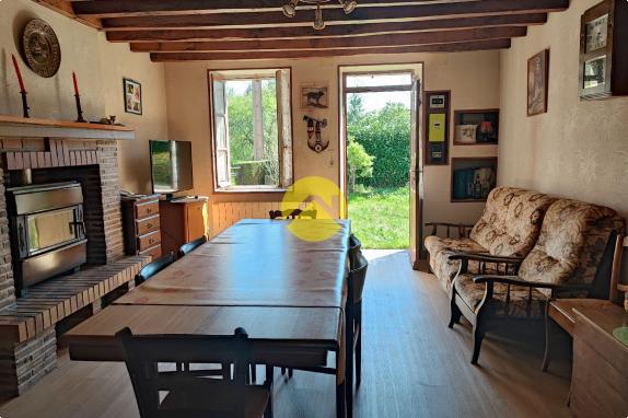 Maison de 55mm² avec un plan d'eau.