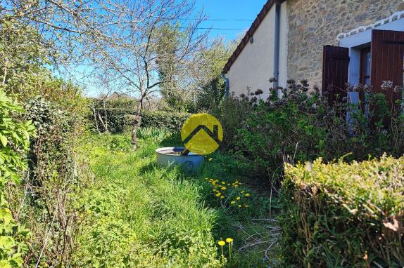 Maison de 55mm² avec un plan d'eau.