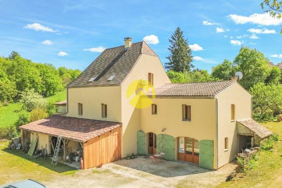 Maison rénovée avec hangar