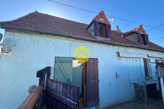 Maison avec dépendances et terrain