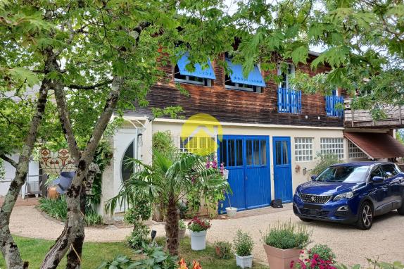 2 maisons et grands garages