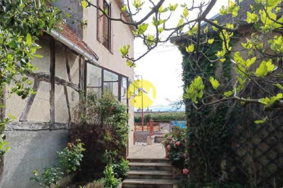 2 maisons avec garage et jardin