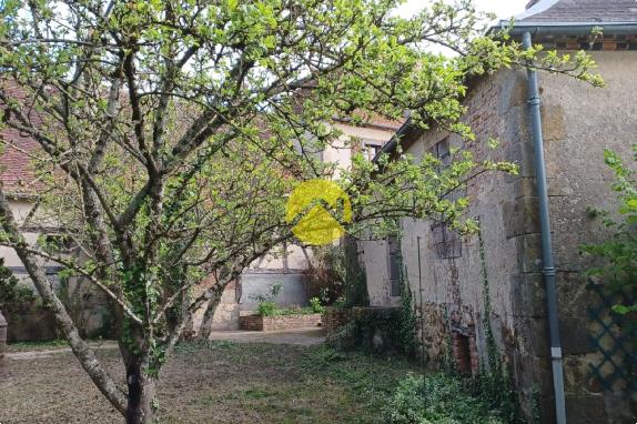 2 maisons avec garage et jardin