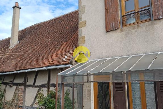 2 maisons avec garage et jardin
