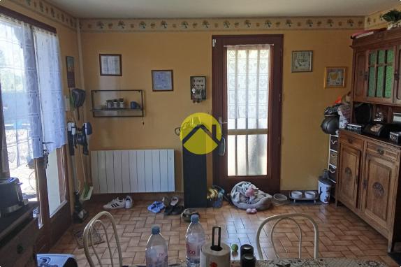 Maison mitoyenne d'un côté