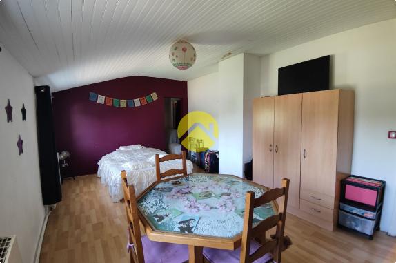 PAVILLON SUR SOUS-SOL T7 150 m² 