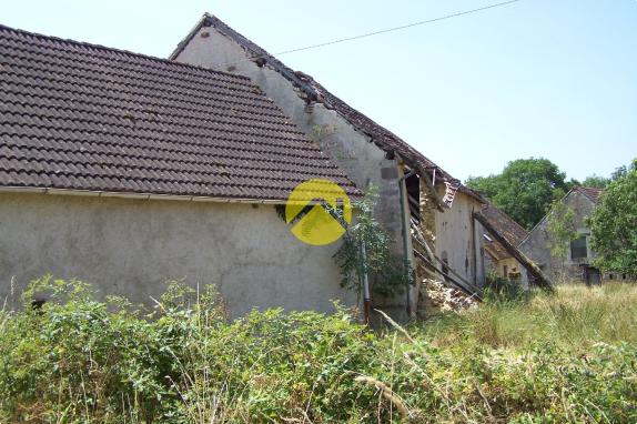  garage et 8 hectares attenant