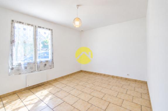 Maison plain-pied au centre village