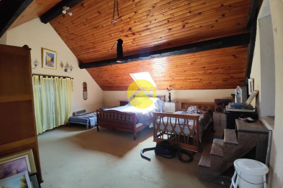 MAISON ANCIENNE AU BORD DU CANAL