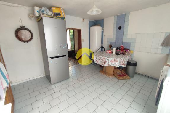 DE PLAIN-PIED DANS HAMEAU PAISIBLE