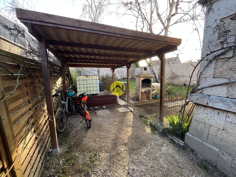 Maison 7 pièces avec jardin.