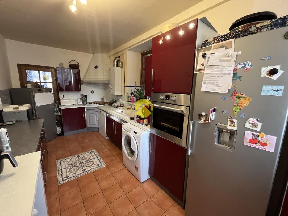 Maison 7 pièces avec jardin.