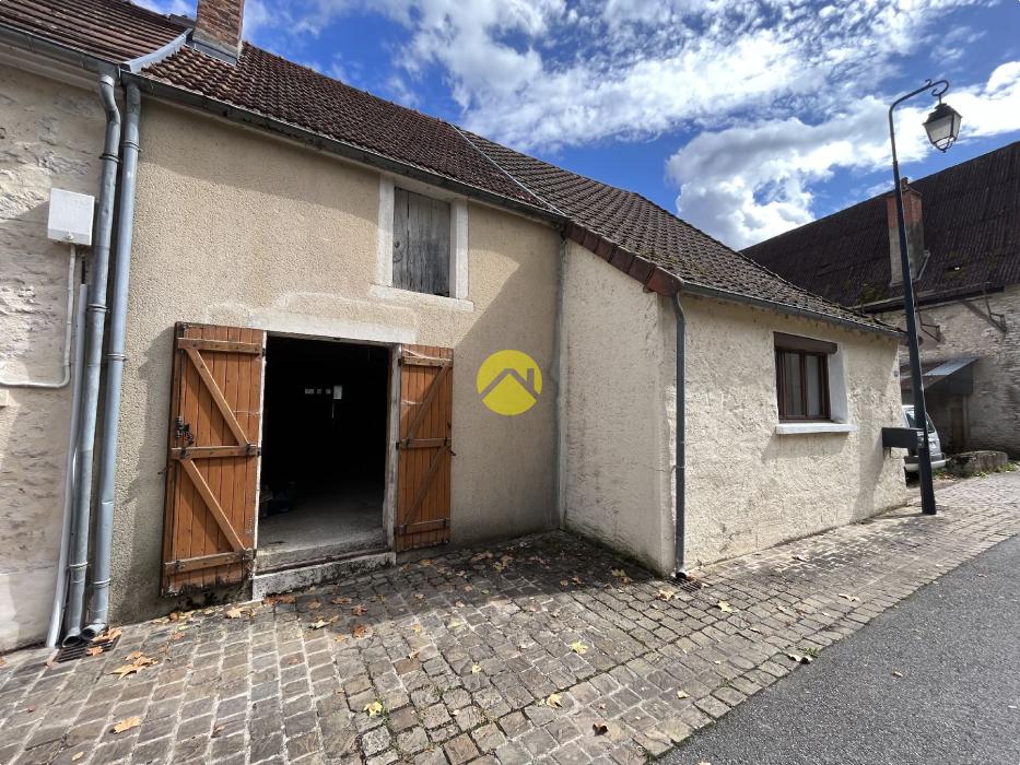 Maison avec jardin et grange 