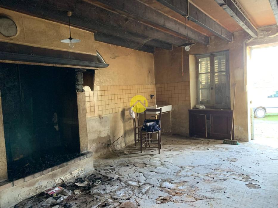 1 maison et 2 granges 