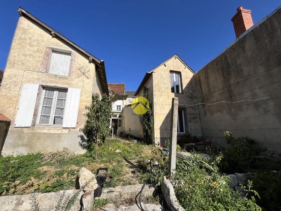 Maison avec local commercial