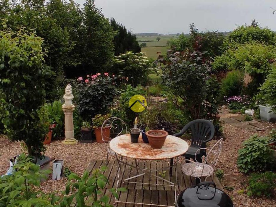 Maison de bourg + jardin 