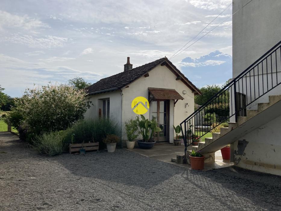 Maison avec terrain au calme