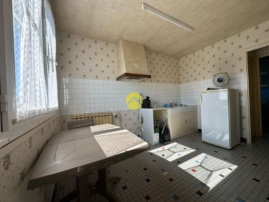 PAVILLON SUR SOUS-SOL  58M² 